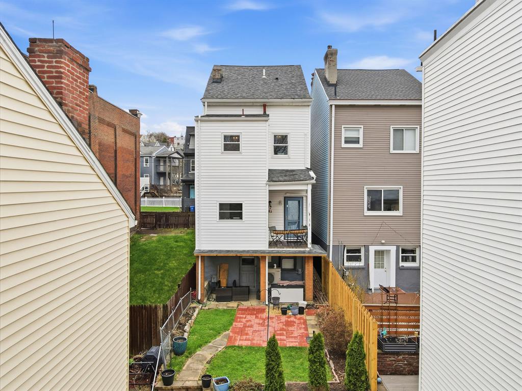 5133 Holmes Street Pittsburgh, PA 15201 - Photo 8 of 45 Enjoy the outdoors on the balcony, covered porch, rear patio or the backyard!