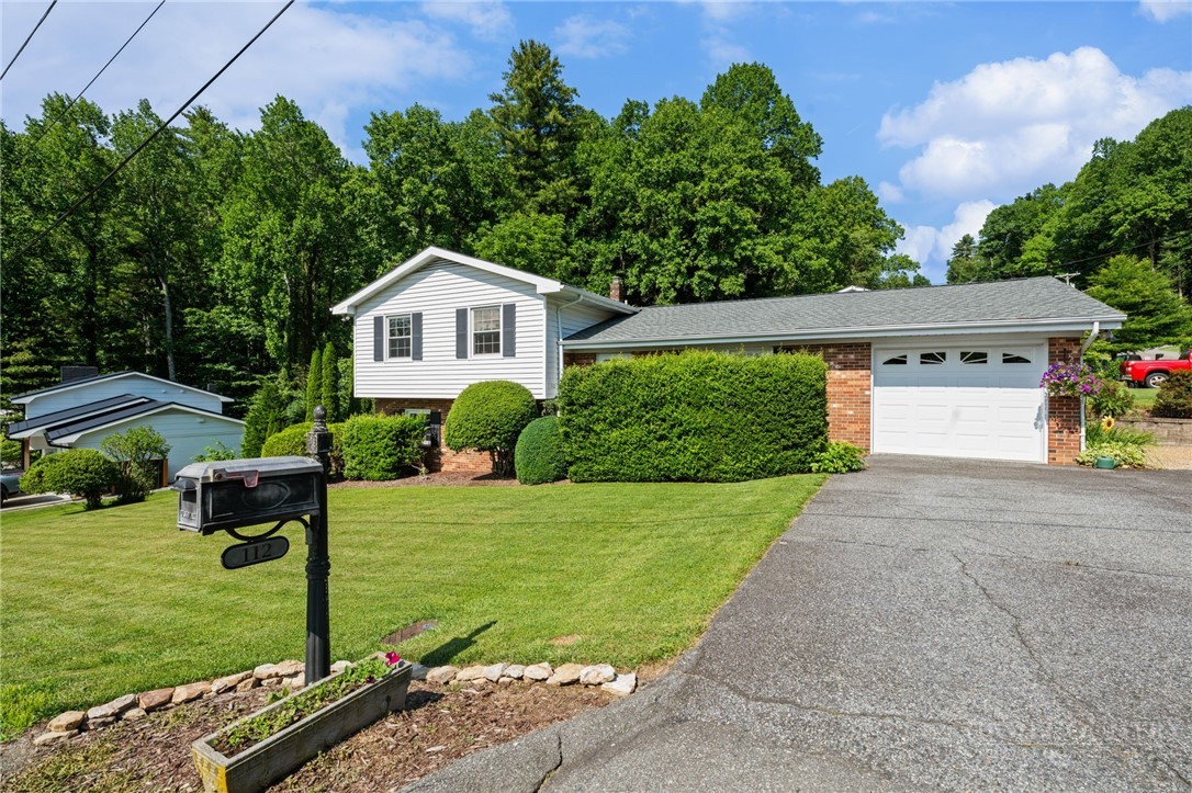 112 Chandy Street Boone, NC 28607 - Photo 2 of 39 a front view of a house with a yard