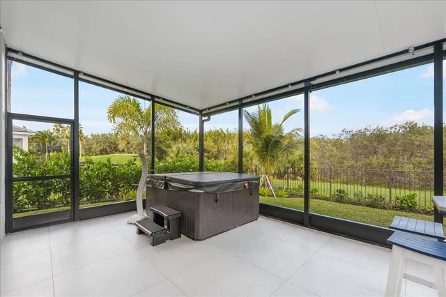 a view of a city from a dining room with large windows