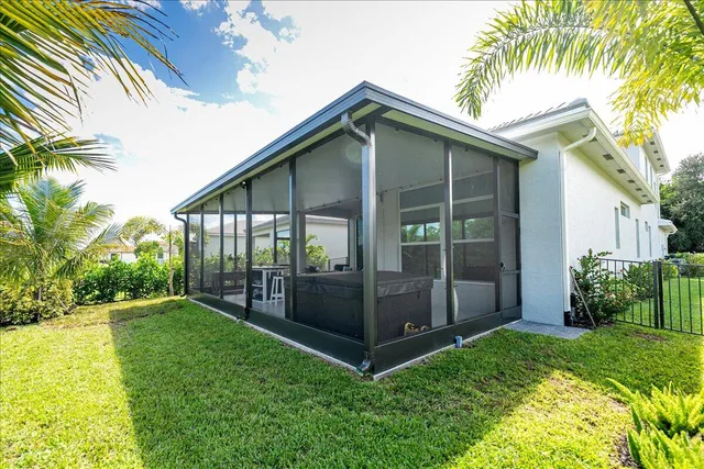 a view of a garden with a building in the background