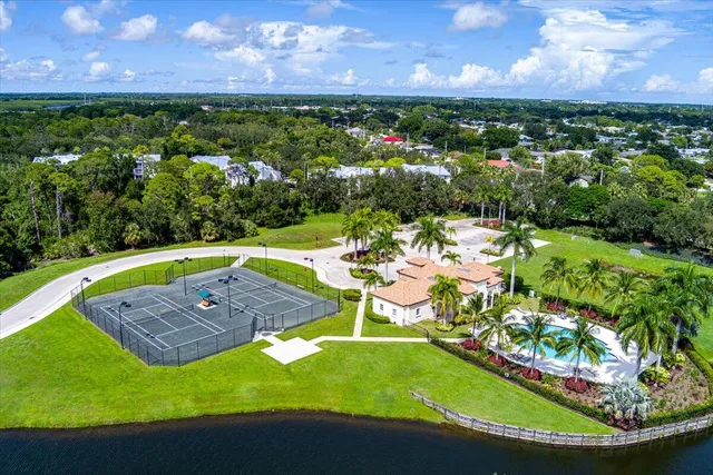 a view of a swimming pool with a yard