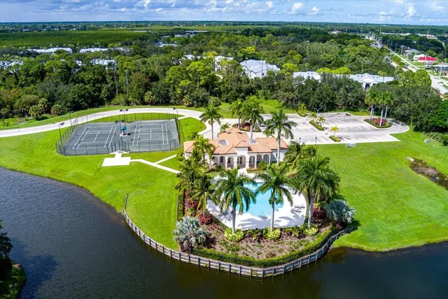 an aerial view of a golf course with swimming pool