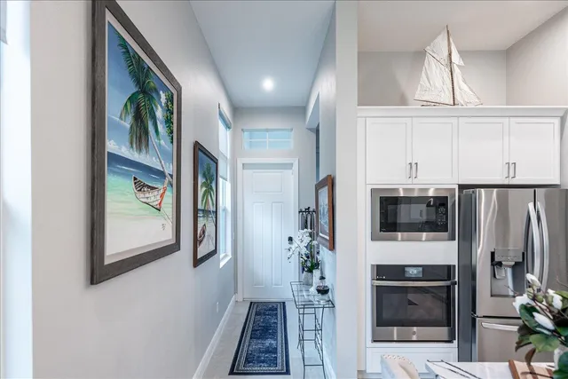 a living room with fireplace furniture and a flat screen tv