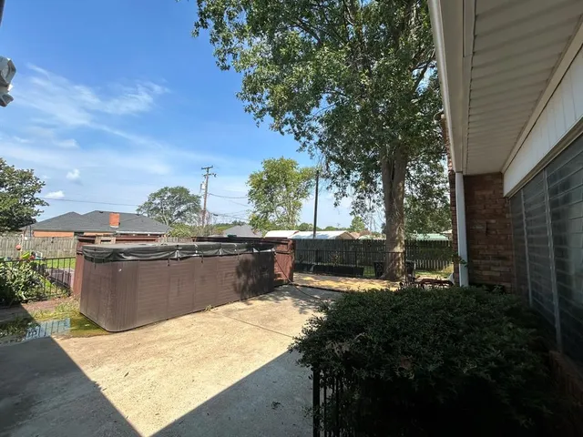 a view of swimming pool with a lounge chairs