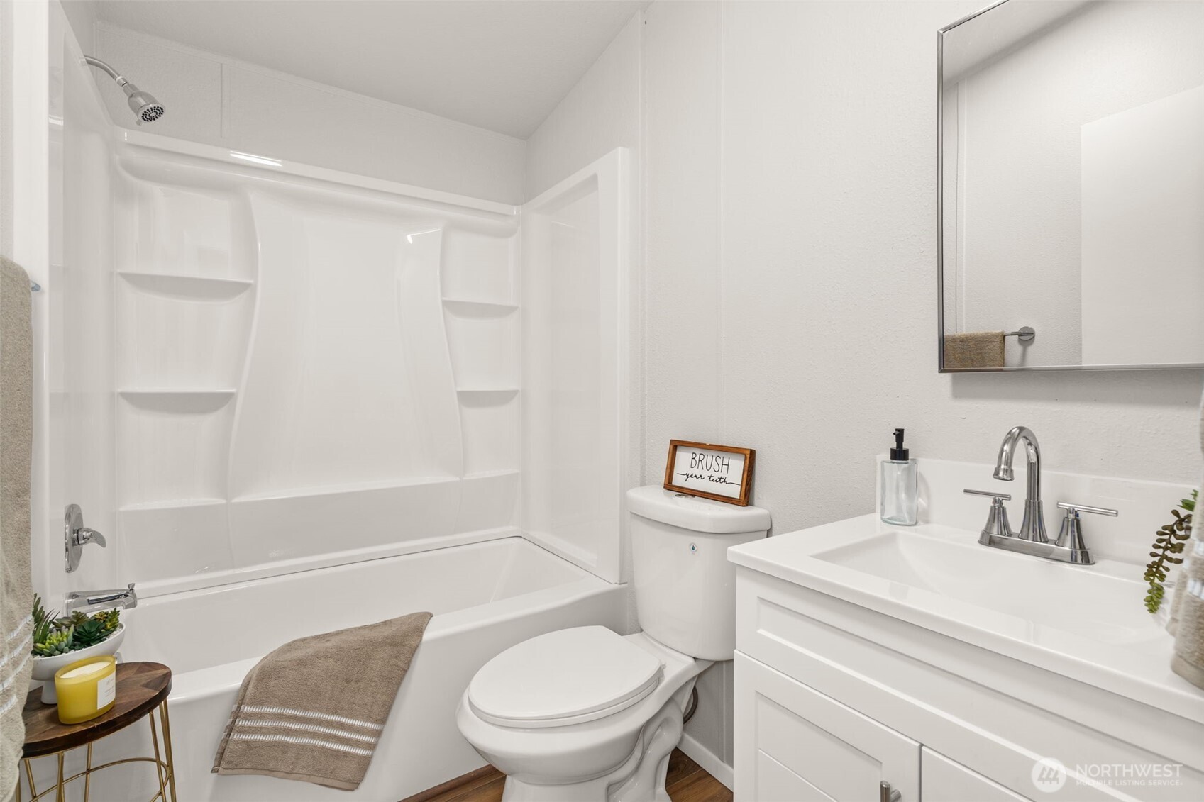 17340 Sargent Road Southwest, Unit 17 Rochester, WA 98579 - Photo 15 of 23 a bathroom with a toilet a sink and bathtub