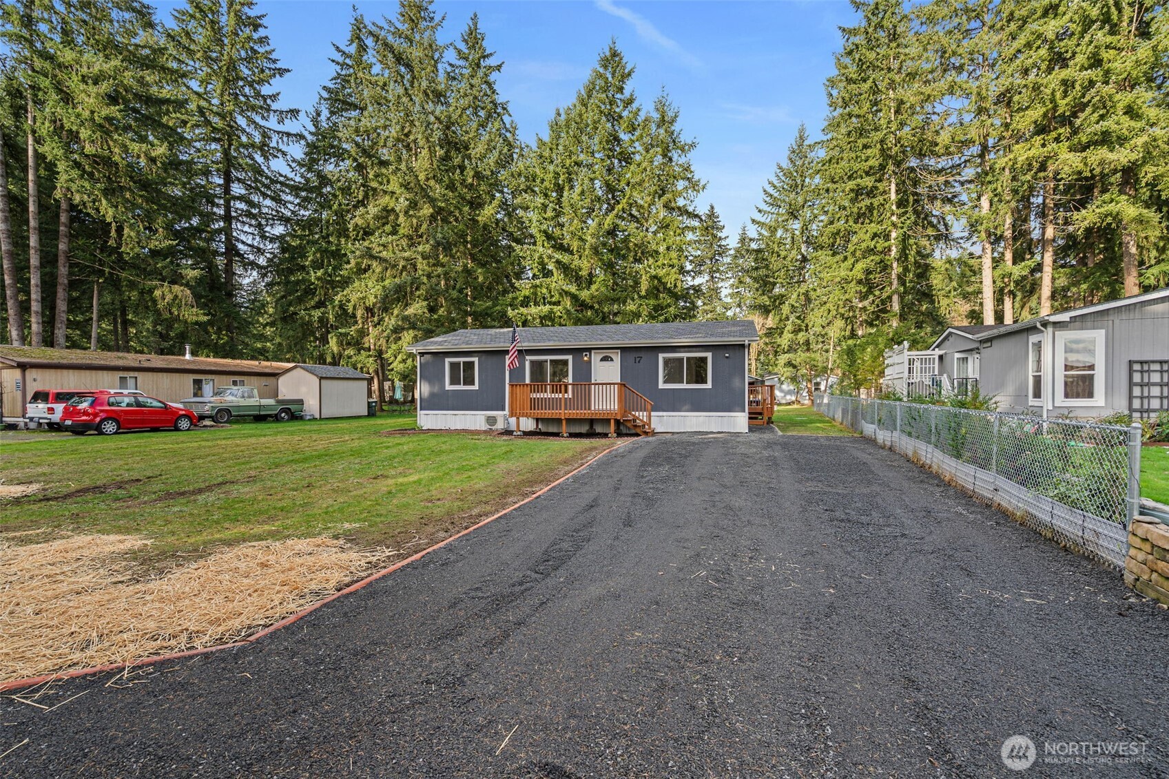 17340 Sargent Road Southwest, Unit 17 Rochester, WA 98579 - Photo 22 of 23 a front view of house with yard and green space