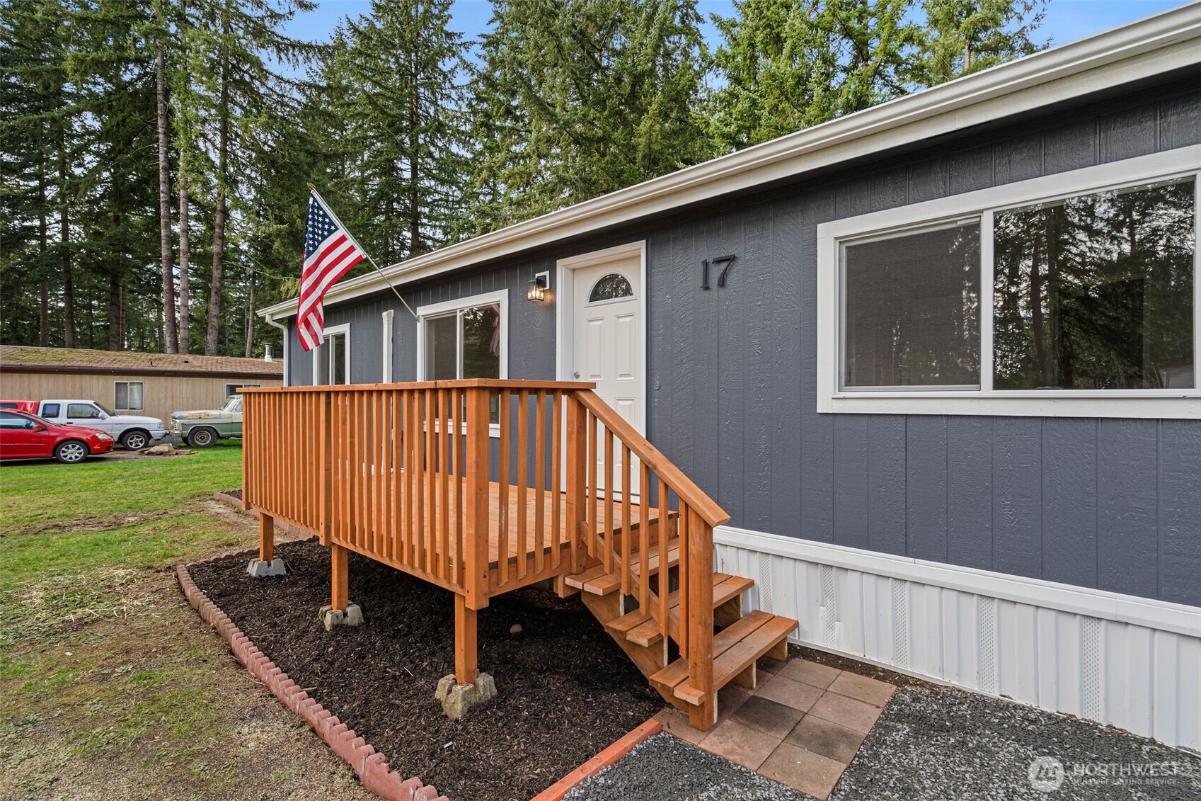 17340 Sargent Road Southwest, Unit 17 Rochester, WA 98579 - Photo 23 of 23 a view of backyard with deck and seating space