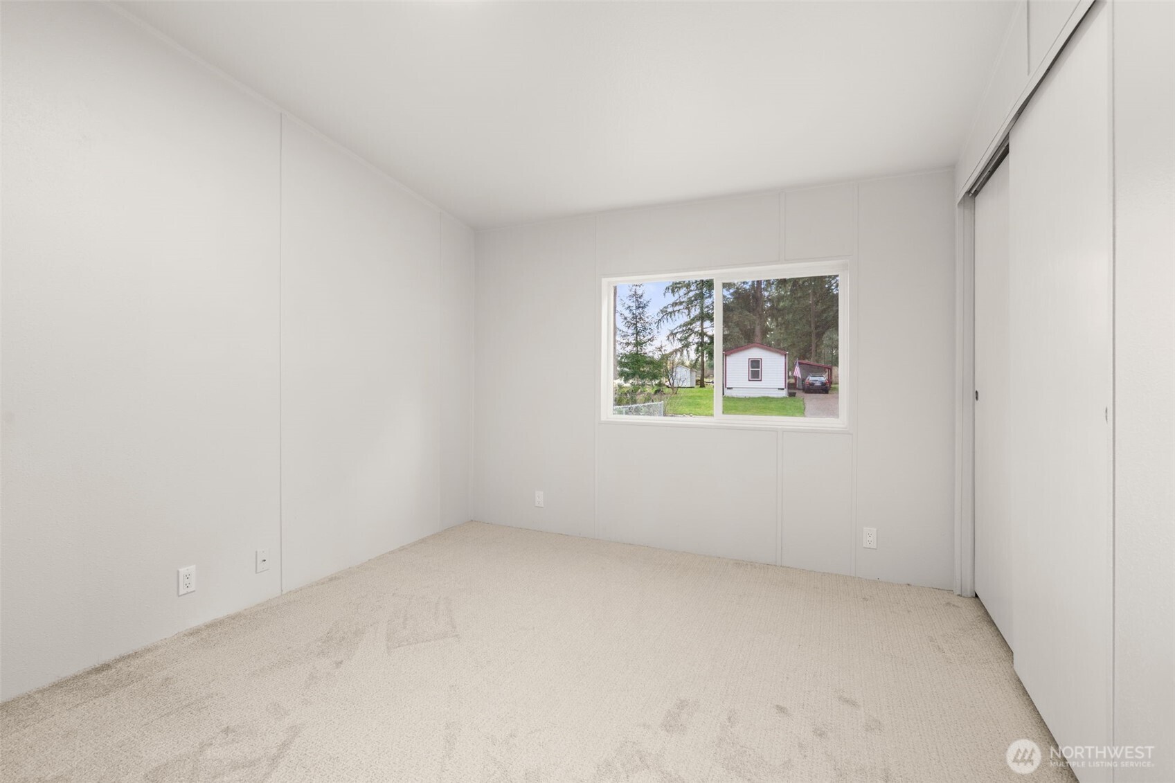 17340 Sargent Road Southwest, Unit 17 Rochester, WA 98579 - Photo 10 of 23 an empty room with a window