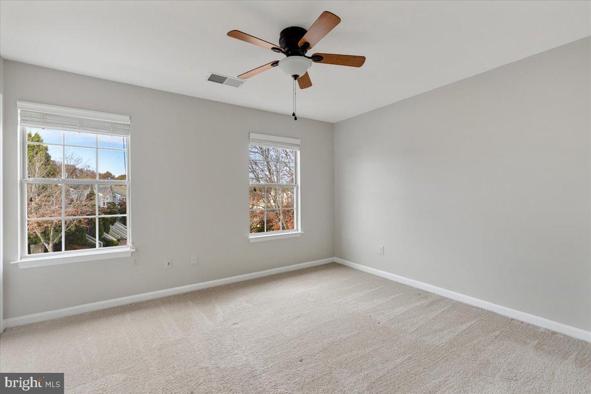 14159 Autumn Circle Centreville, VA 20121 - Photo 19 of 34 a view of an empty room with a window