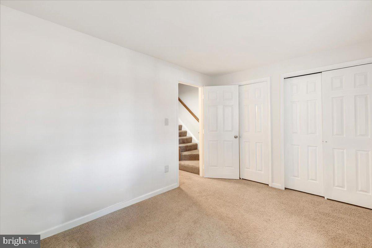 14159 Autumn Circle Centreville, VA 20121 - Photo 25 of 34 a view of an empty room with a hallway
