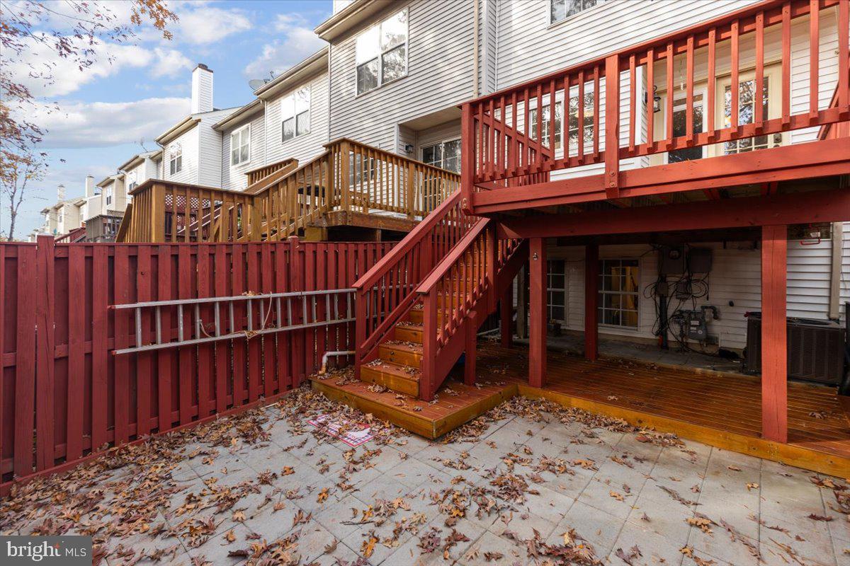 14159 Autumn Circle Centreville, VA 20121 - Photo 32 of 34 a view of a house with a wooden deck