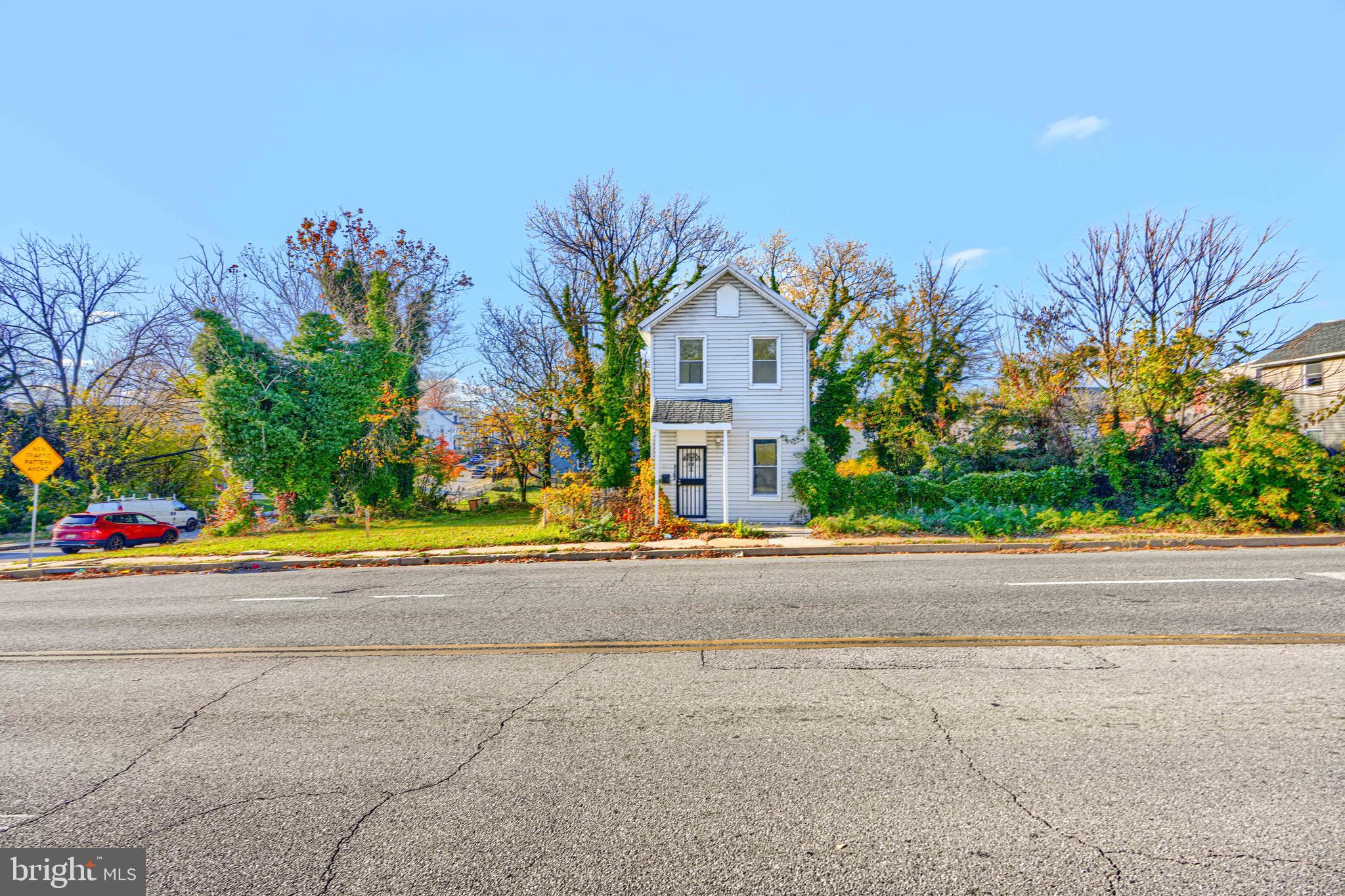 front view of a house with a street