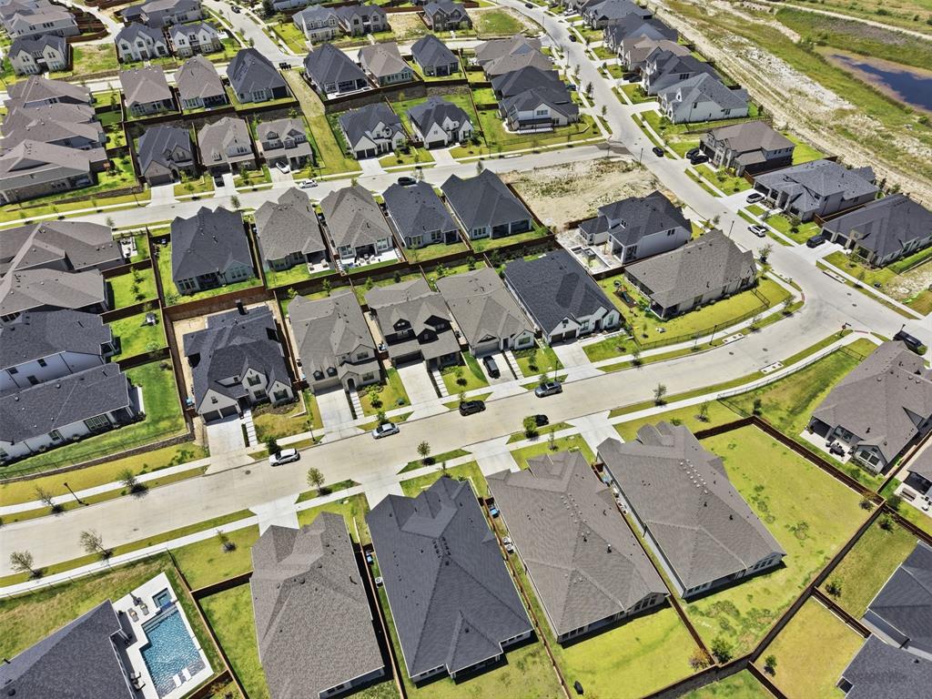 15413 Short Rdg Lane Fort Worth, TX 76008 - Photo 39 of 39 Expansive aerial view showcasing a developed residential community with numerous single-family homes