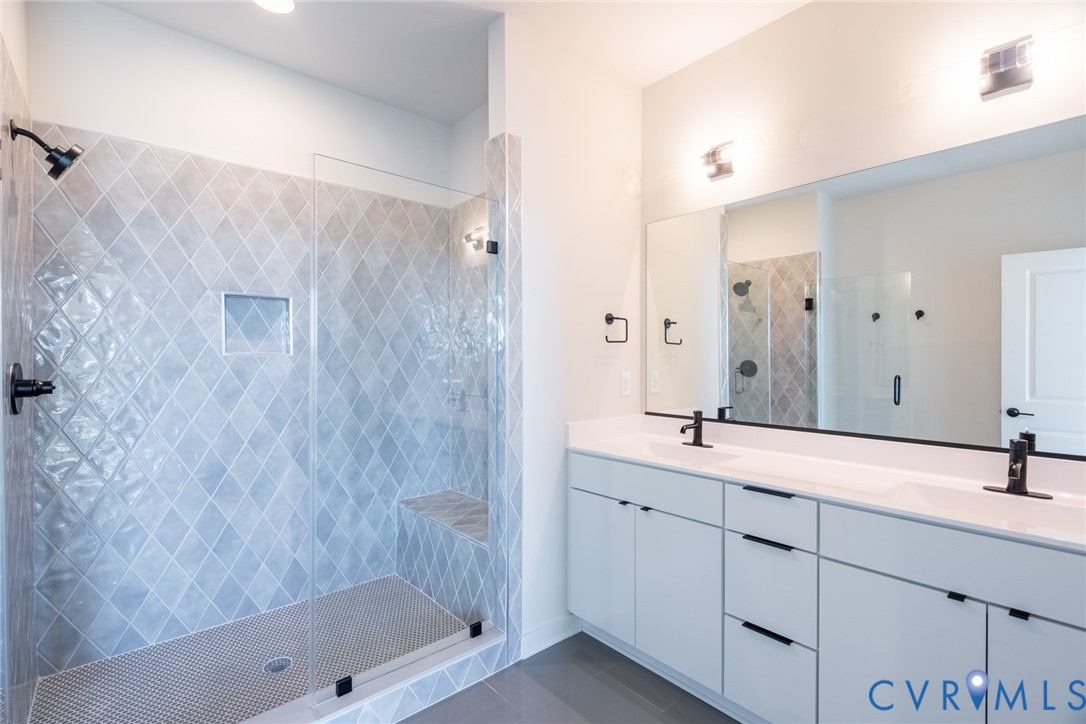 213 Golden Haze Alley, Unit 31 Midlothian, VA 23113 - Photo 7 of 15 a bathroom with a double vanity sink mirror and shower