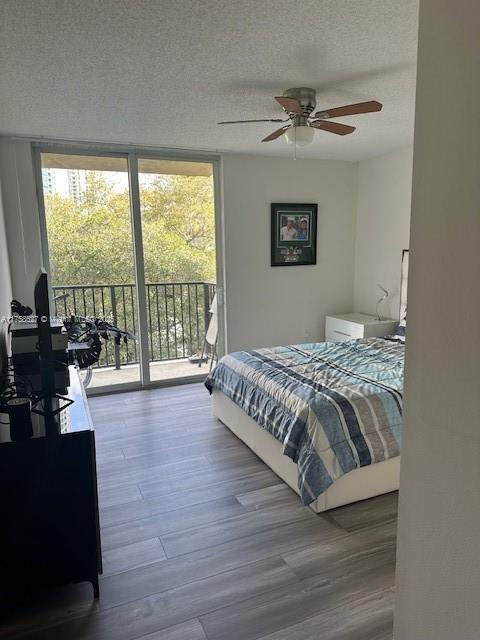 520 Southeast 5th Avenue, Unit 2307 Fort Lauderdale, FL 33301 - Photo 12 of 21 a bedroom with a bed and a large window