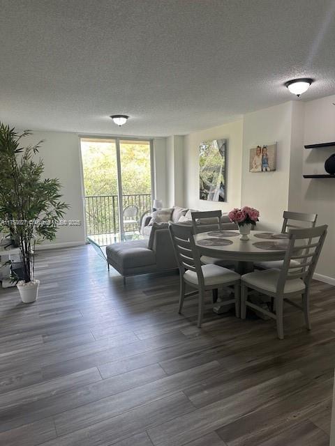 520 Southeast 5th Avenue, Unit 2307 Fort Lauderdale, FL 33301 - Photo 16 of 21 a dining room with furniture window and wooden floor