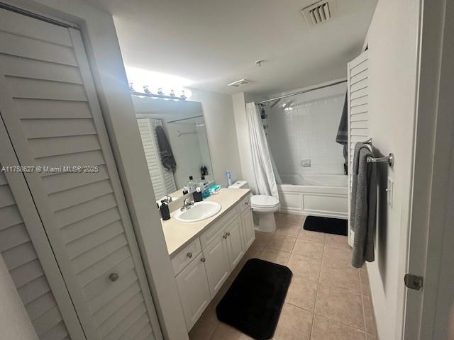 520 Southeast 5th Avenue, Unit 2307 Fort Lauderdale, FL 33301 - Photo 9 of 21 a bathroom with a sink a toilet and a mirror