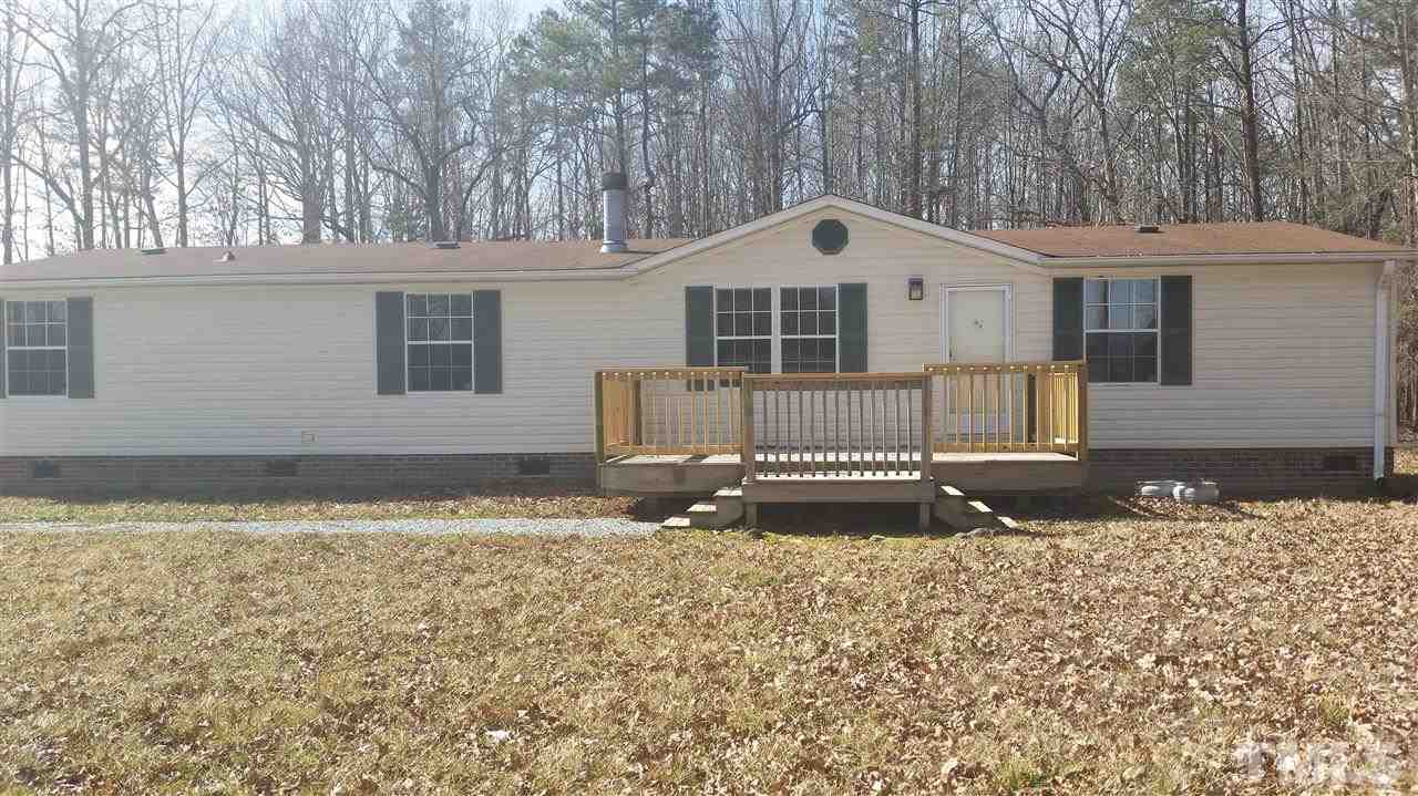 4815 Brown Road Rougemont, NC 27572 - Photo 2 of 23 a front view of a house with a yard