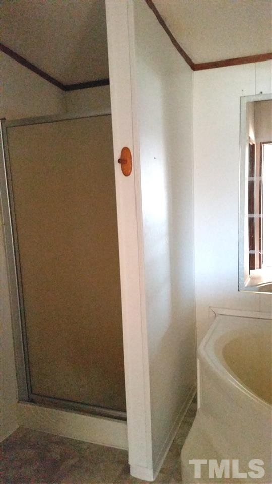 4815 Brown Road Rougemont, NC 27572 - Photo 11 of 23 a bathroom with a bathtub