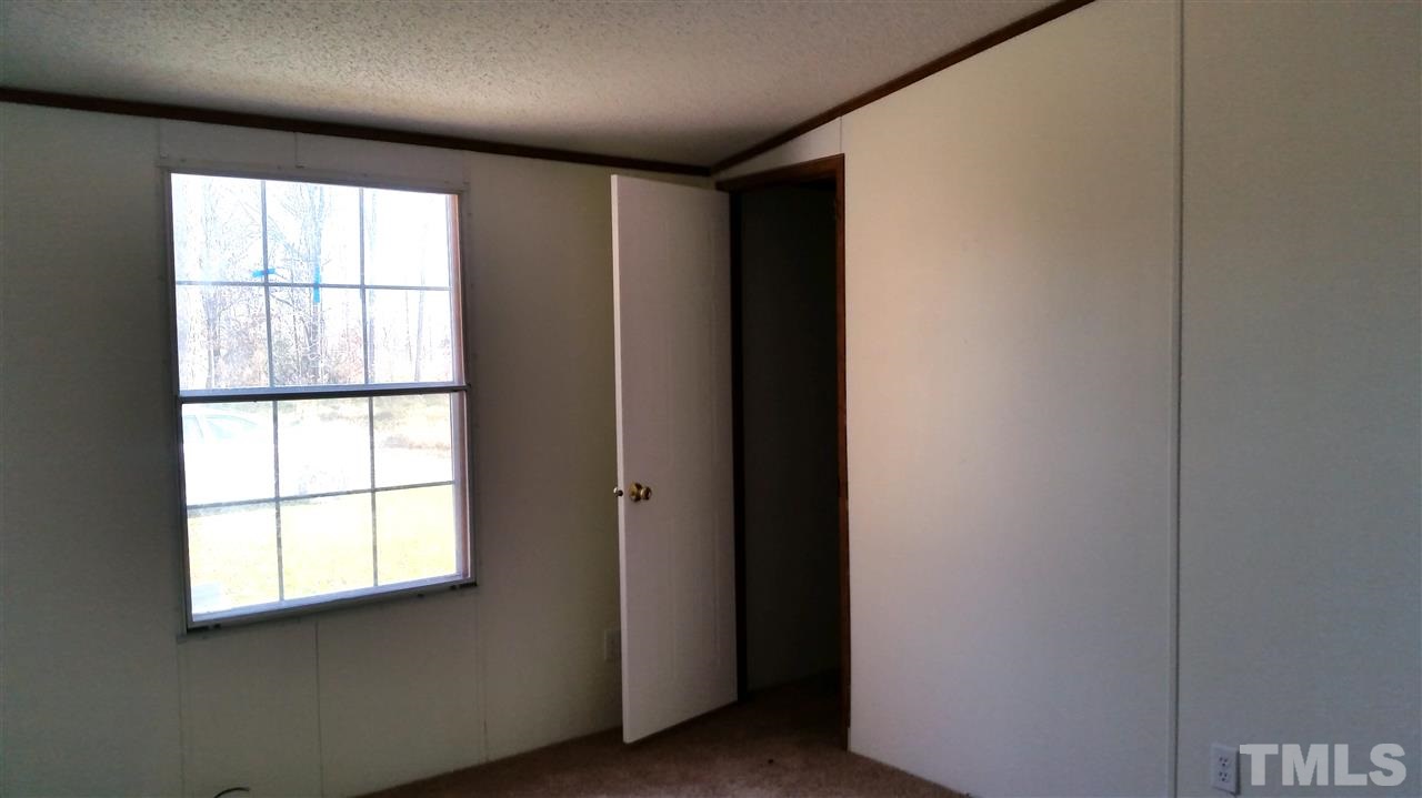 4815 Brown Road Rougemont, NC 27572 - Photo 13 of 23 a view of an empty room with a window