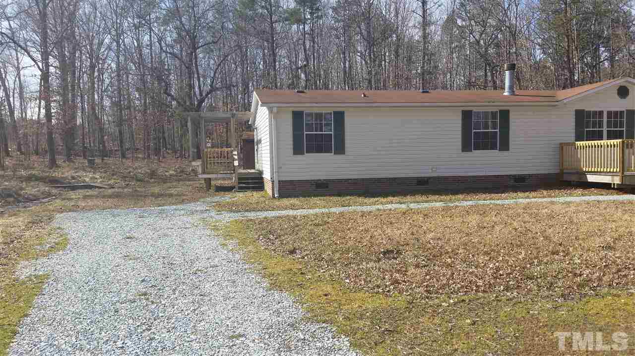 4815 Brown Road Rougemont, NC 27572 - Photo 15 of 23 a view of a house with a yard