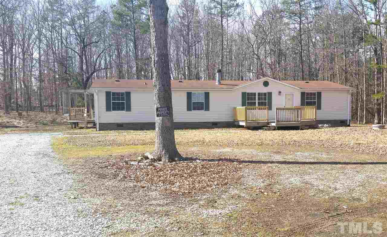 4815 Brown Road Rougemont, NC 27572 - Photo 16 of 23 a front view of a house with a yard