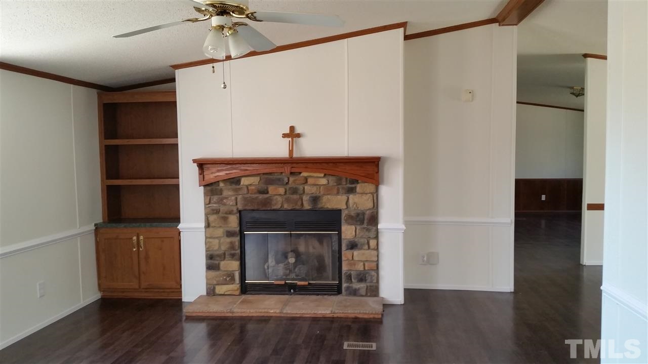 4815 Brown Road Rougemont, NC 27572 - Photo 3 of 23 a living room with a fireplace