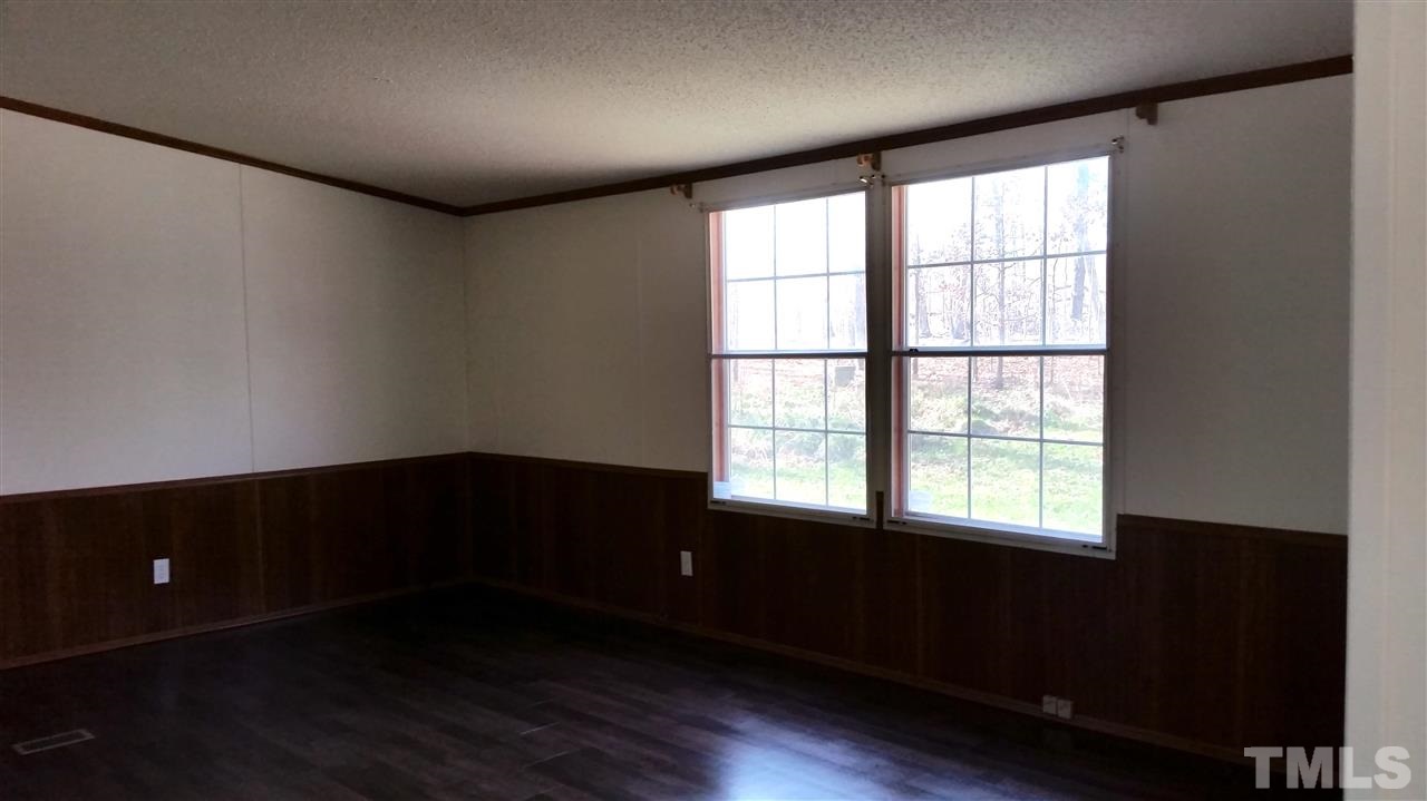 4815 Brown Road Rougemont, NC 27572 - Photo 5 of 23 wooden floor in an empty room with a window