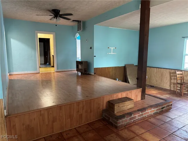 a view of a living room and bathroom