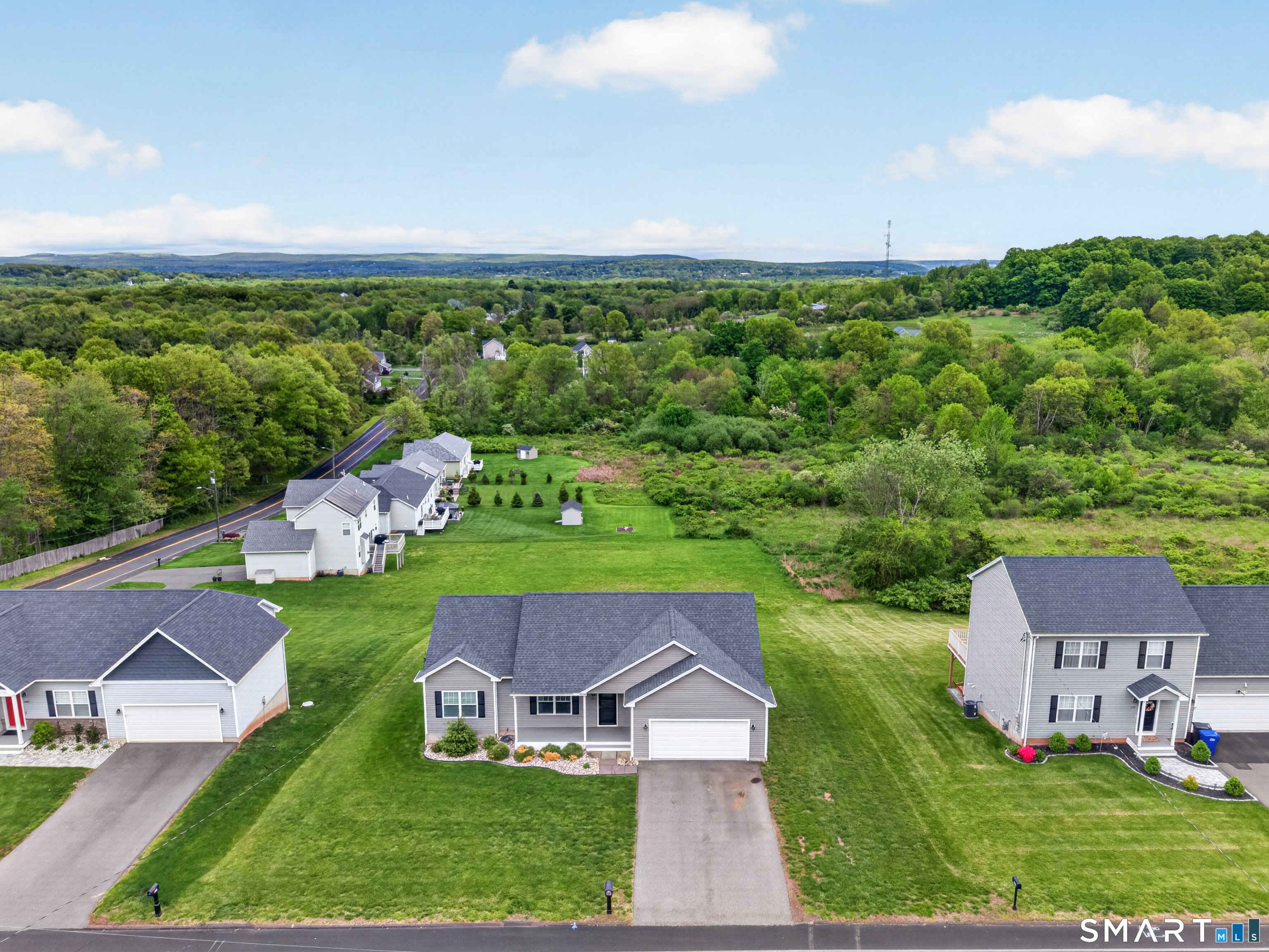650 Ridgewood Road Middletown, CT 06457 - Photo 4 of 40 an aerial view of a house with garden