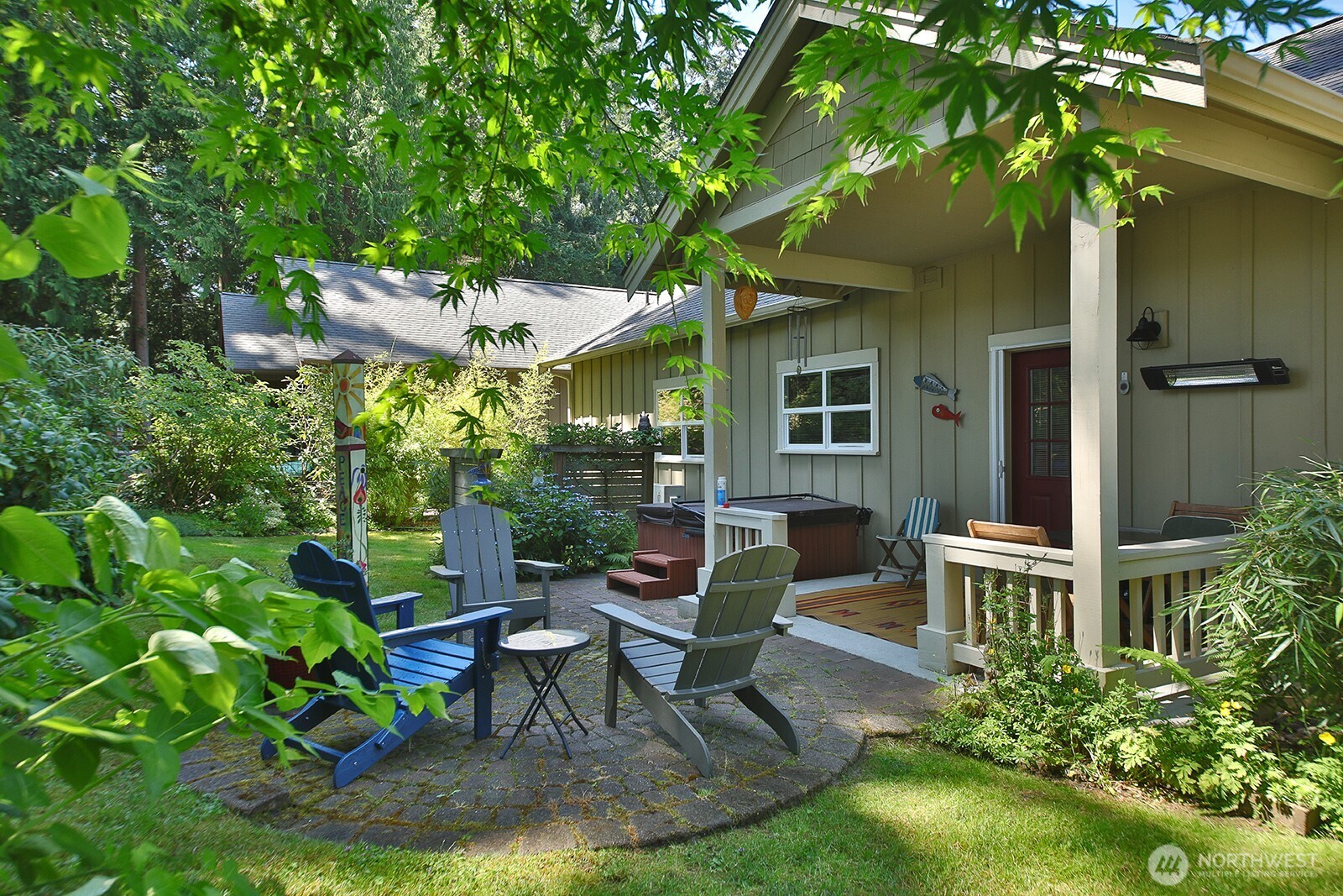 1050 Village Loop Langley, WA 98260 - Photo 14 of 39 a view of a house with backyard and sitting area