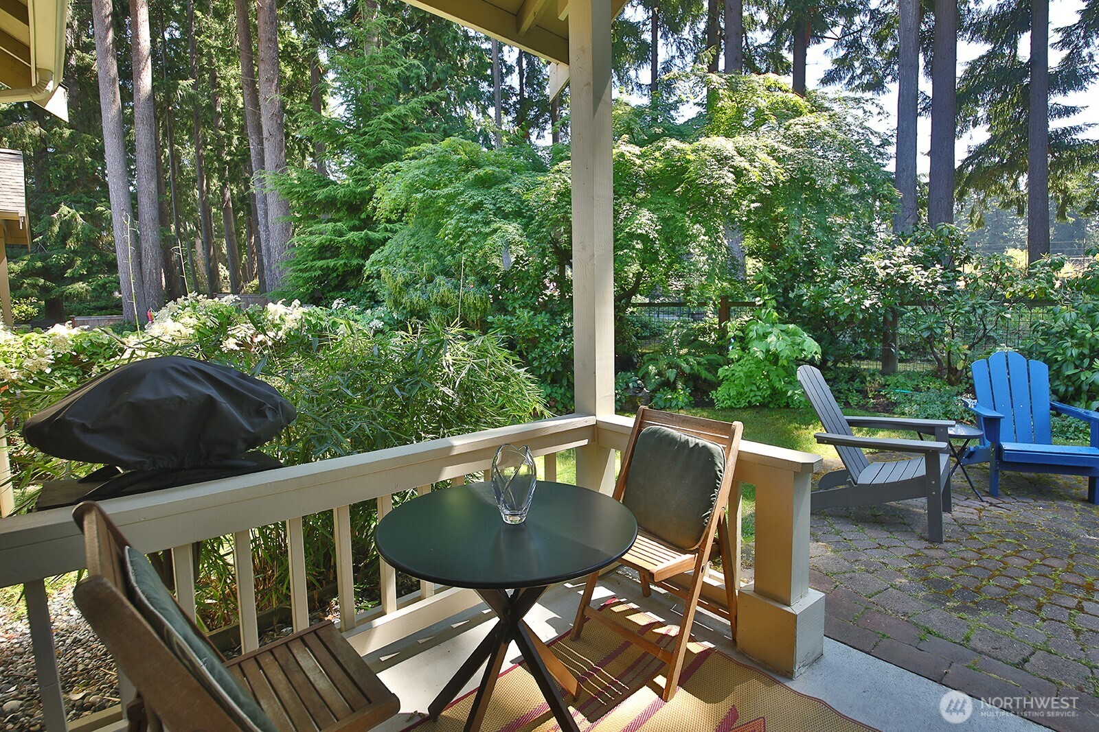 1050 Village Loop Langley, WA 98260 - Photo 15 of 39 a view of balcony with furniture and a garden