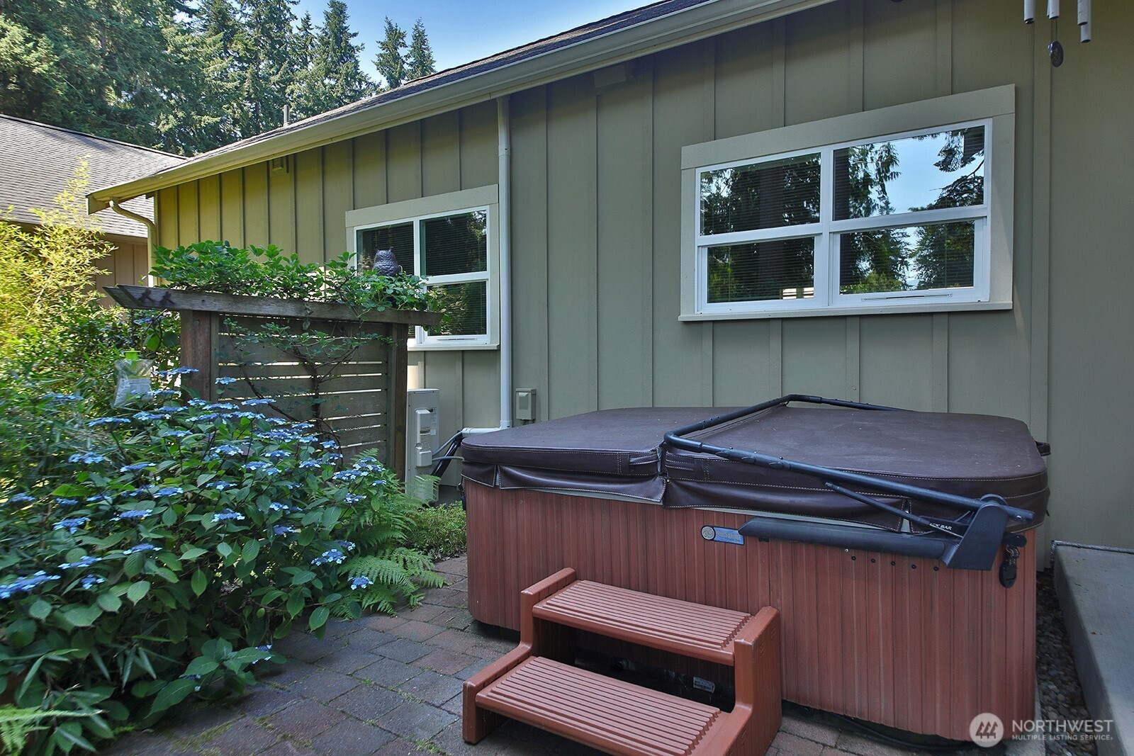 1050 Village Loop Langley, WA 98260 - Photo 17 of 39 a backyard of a house with seating space