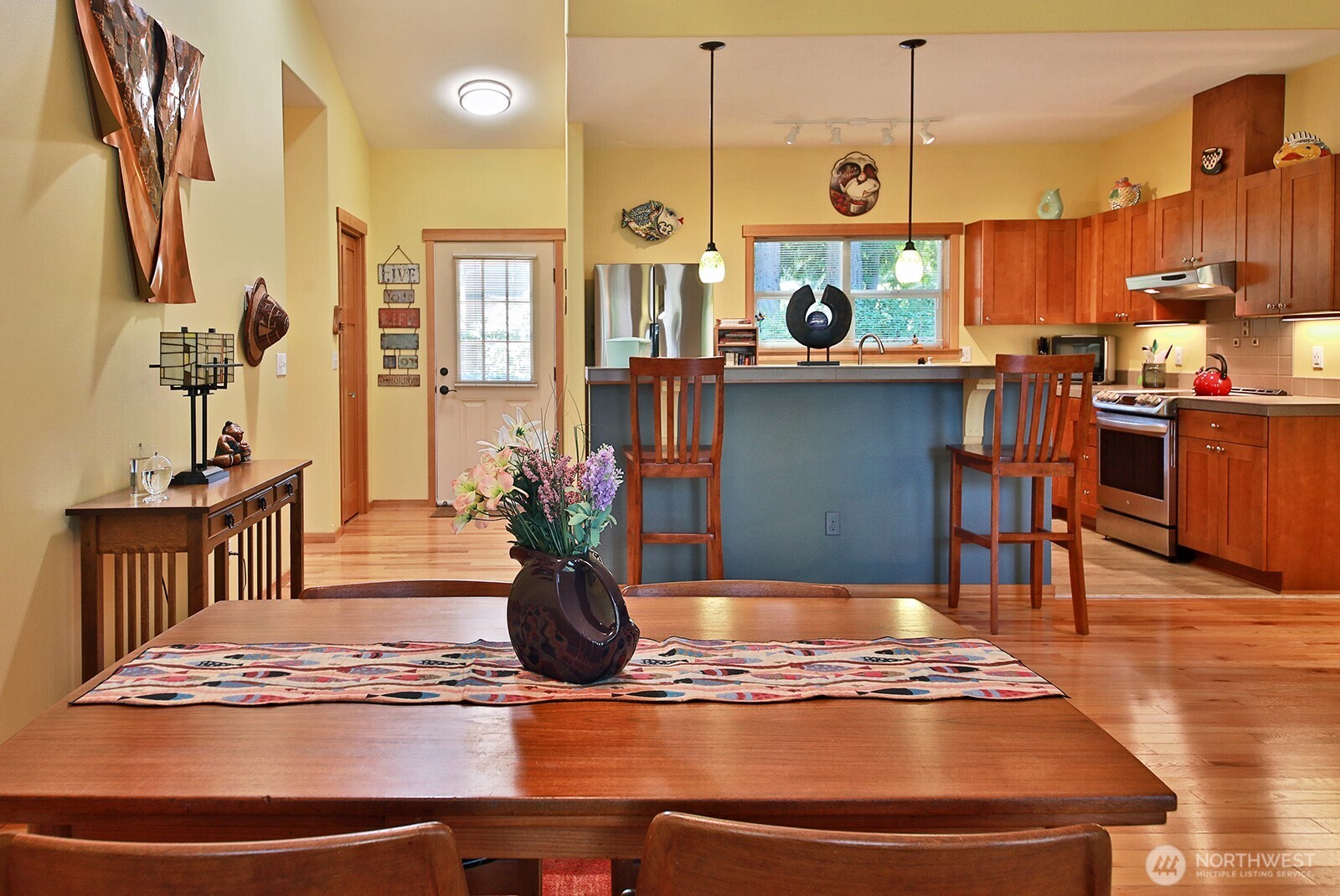 1050 Village Loop Langley, WA 98260 - Photo 23 of 39 a view of a living room and kitchen