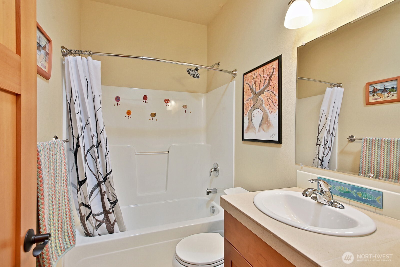 1050 Village Loop Langley, WA 98260 - Photo 35 of 39 a bathroom with a sink toilet and shower
