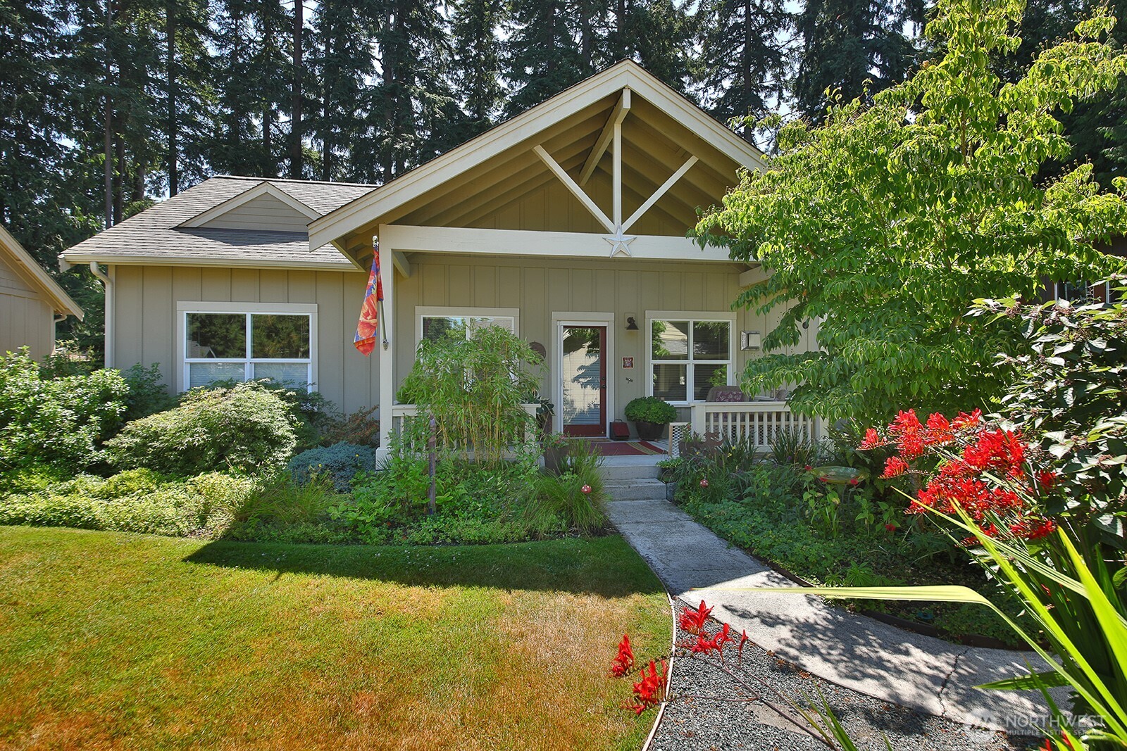 1050 Village Loop Langley, WA 98260 - Photo 6 of 39 a front view of a house with garden