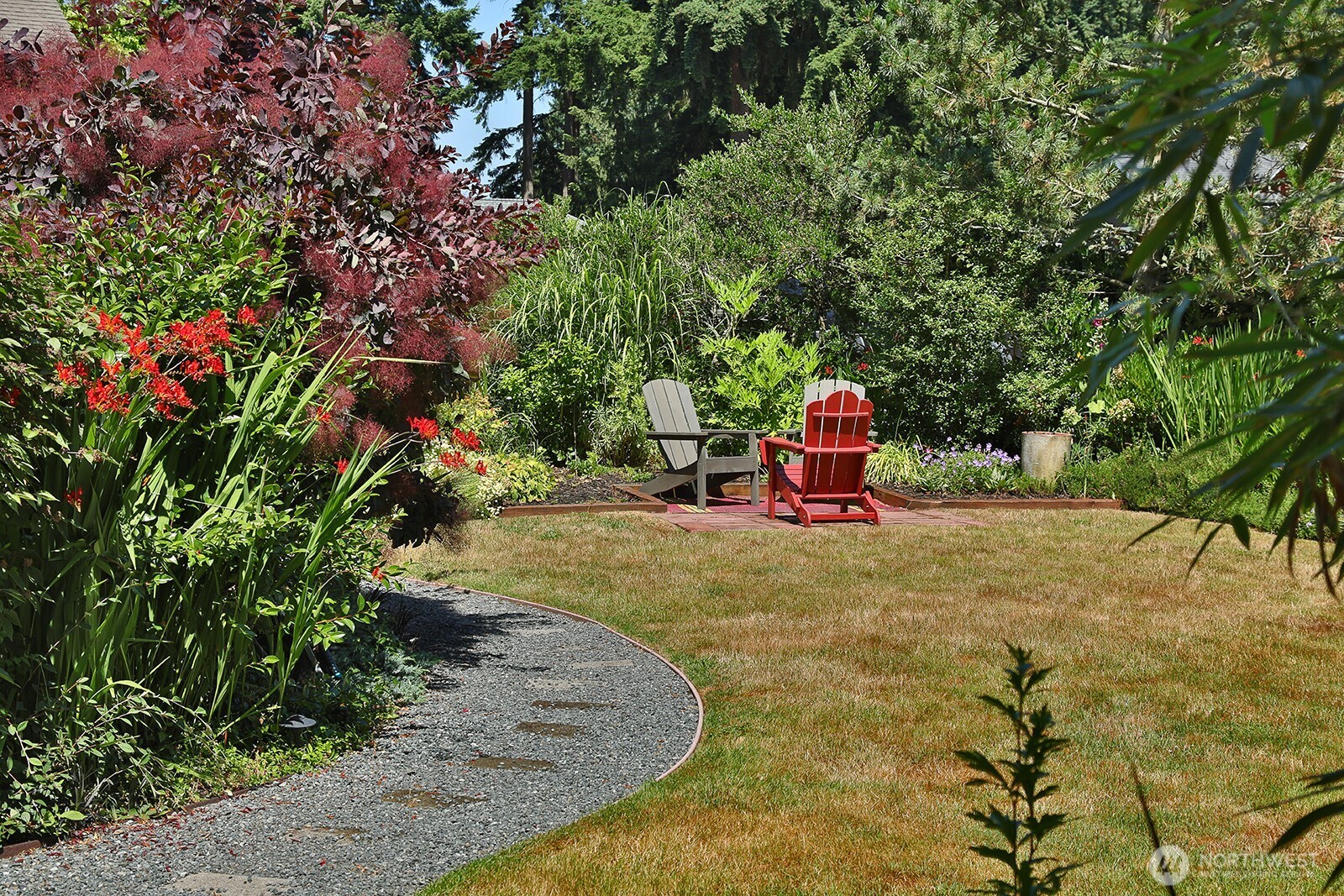 1050 Village Loop Langley, WA 98260 - Photo 9 of 39 a backyard of a house with a yard and entertaining space
