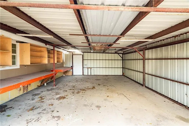 a view of a room with wooden walls