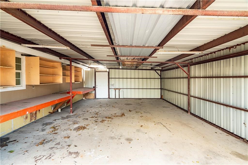 715 Bosquez Street Robstown, TX 78380 - Photo 15 of 18 a view of a room with wooden walls