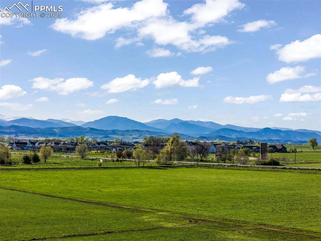 1805 West County Road 8 Berthoud, CO 80513 - Photo 17 of 48 a view of an houses with outdoor view and green space