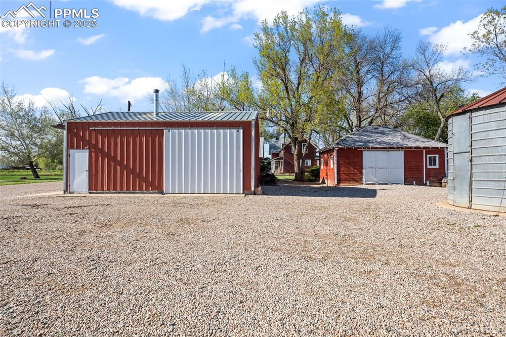 1805 West County Road 8 Berthoud, CO 80513 - Photo 25 of 48 a view of a house with a snow in the yard