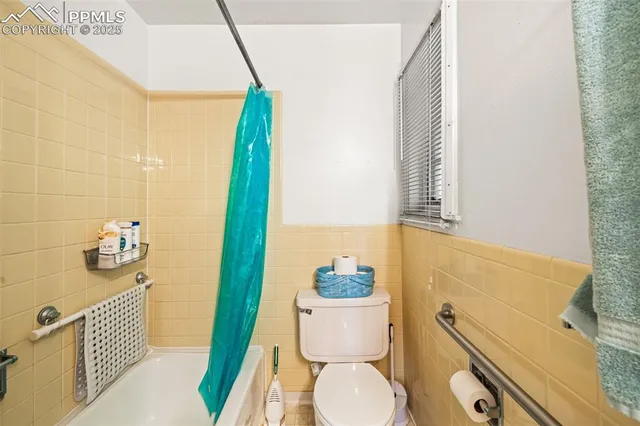 a bathroom with a sink and toilet