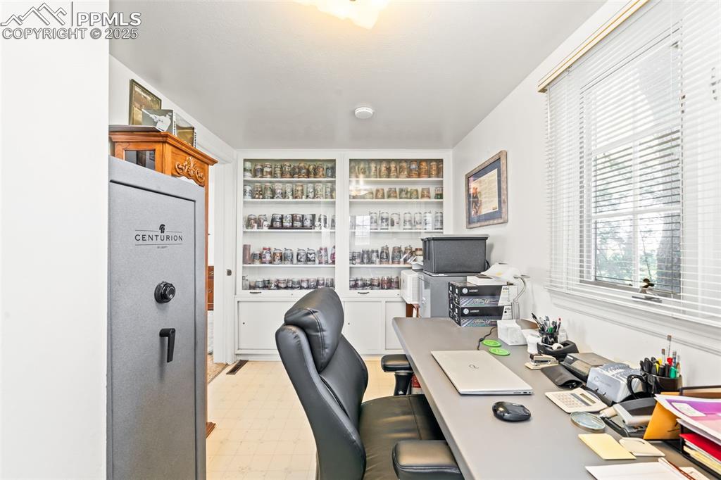 1805 West County Road 8 Berthoud, CO 80513 - Photo 36 of 48 a view of a workspace with furniture and a window