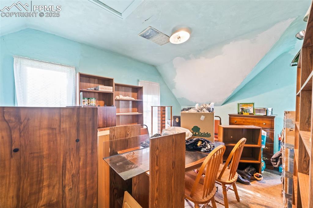 1805 West County Road 8 Berthoud, CO 80513 - Photo 40 of 48 a view of a dining room with furniture and a window
