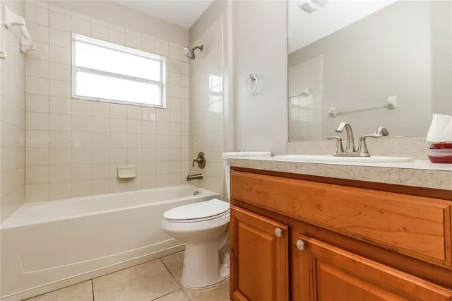 a bathroom with a sink a toilet and a bathtub
