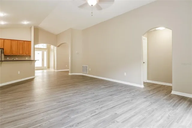 a view of a kitchen with a sink and a microwave