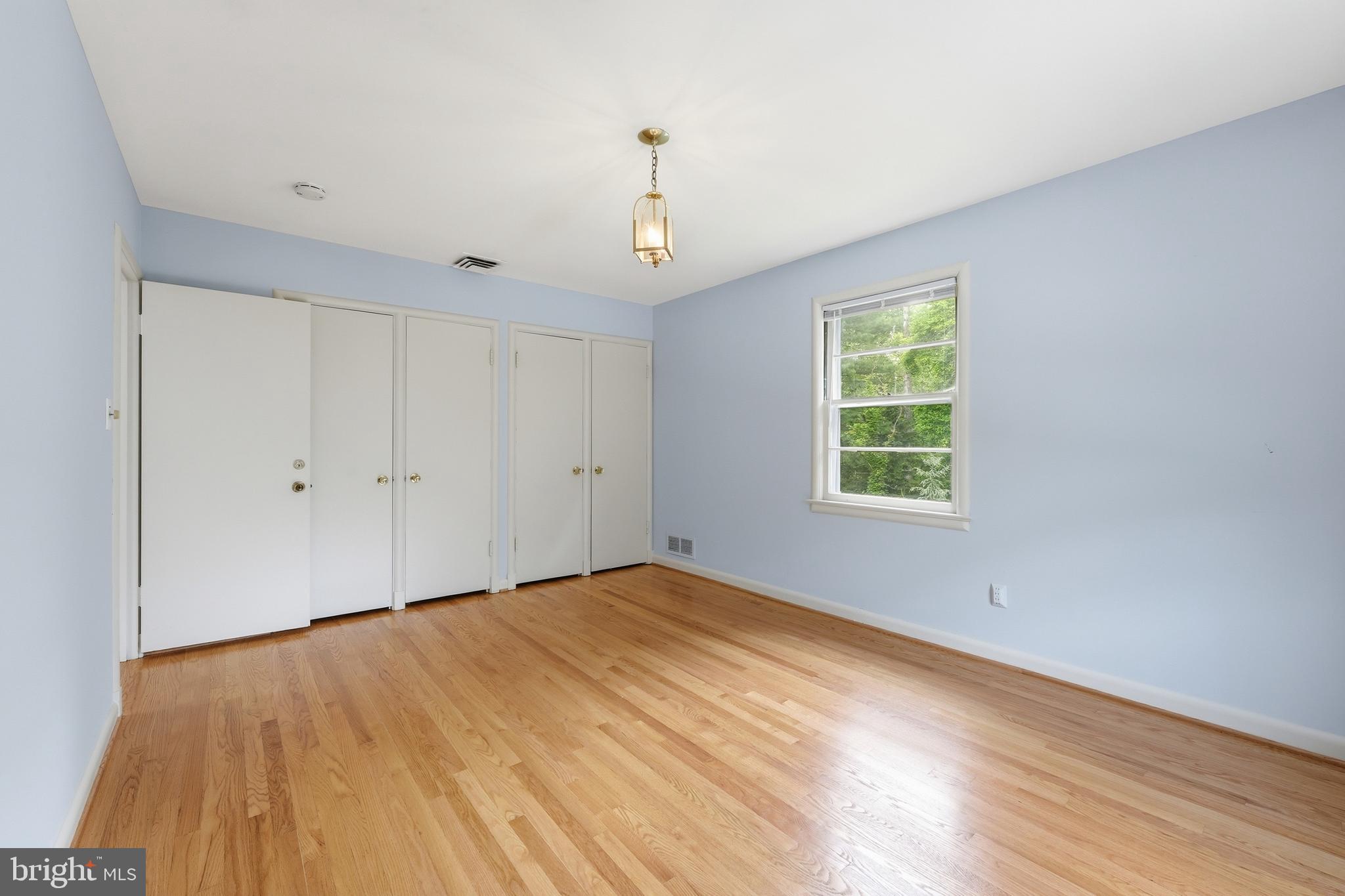 228 Northwest Terrace Silver Spring, MD 20901 - Photo 30 of 70 a view of empty room with wooden floor and fan