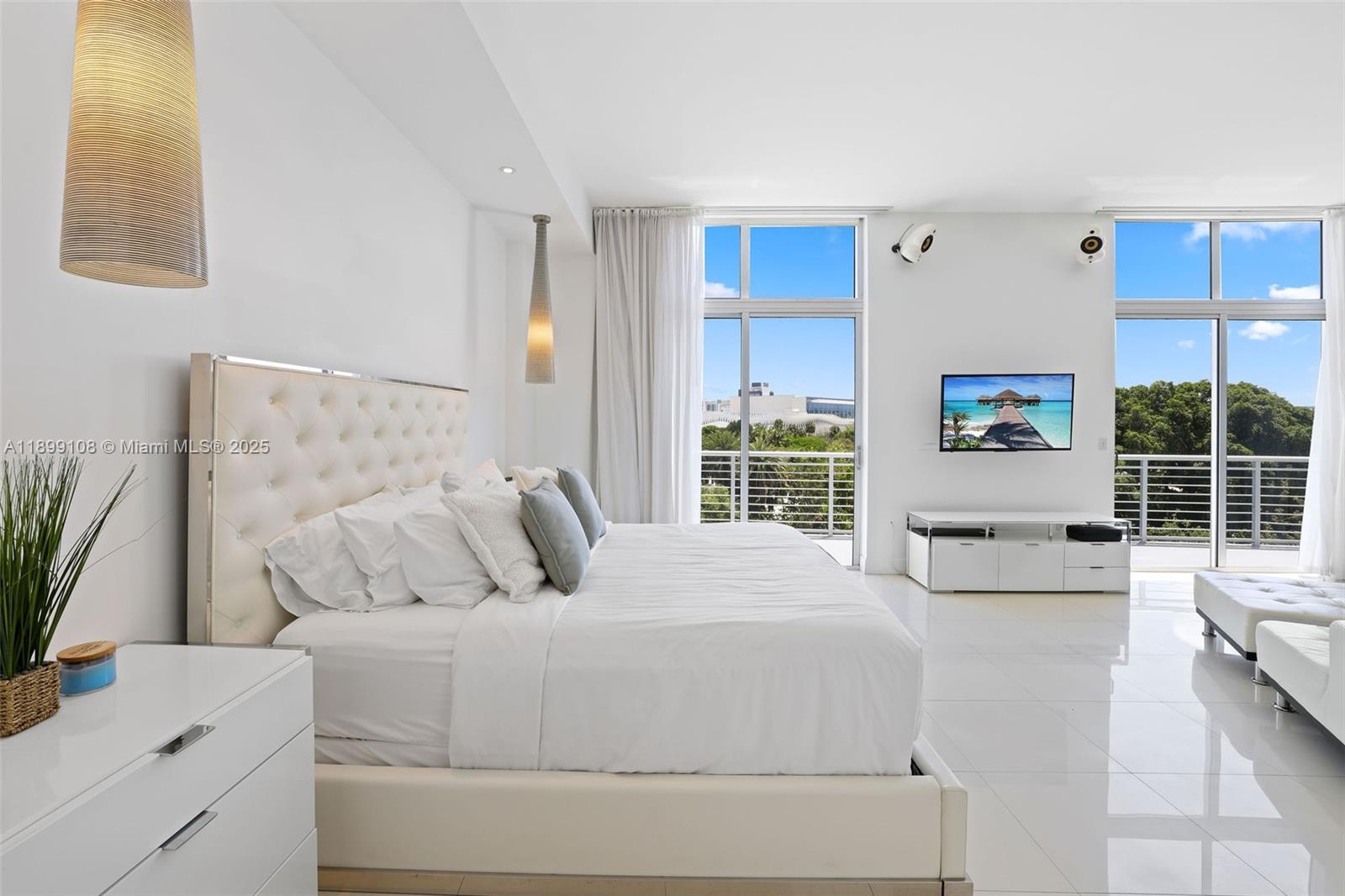 2001 Meridian Avenue, Unit 506 Miami Beach, FL 33139 - Photo 13 of 40 a large white bed in a white room