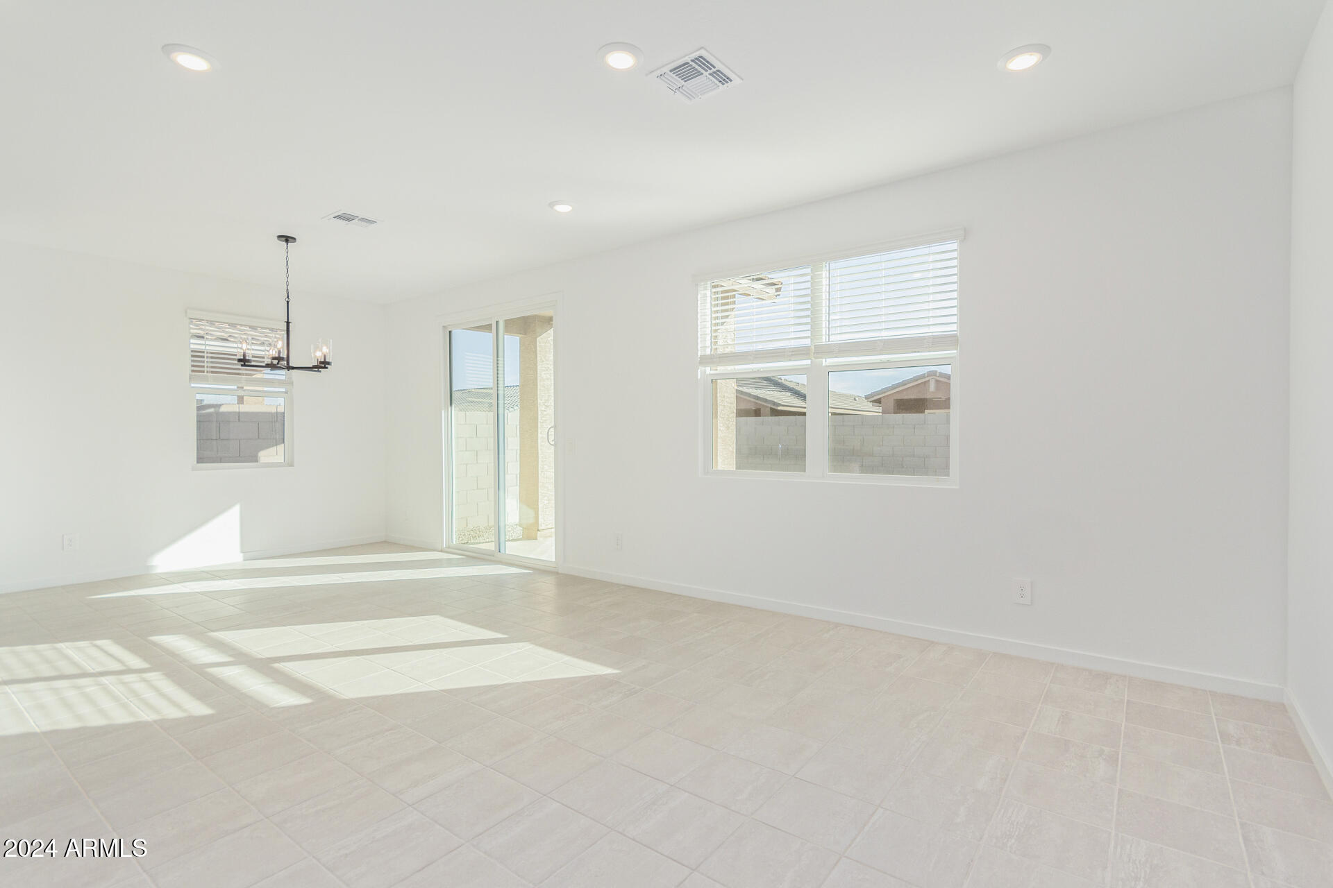 17629 West Madison Street Goodyear, AZ 85338 - Photo 14 of 46 Great Room / Dining Area