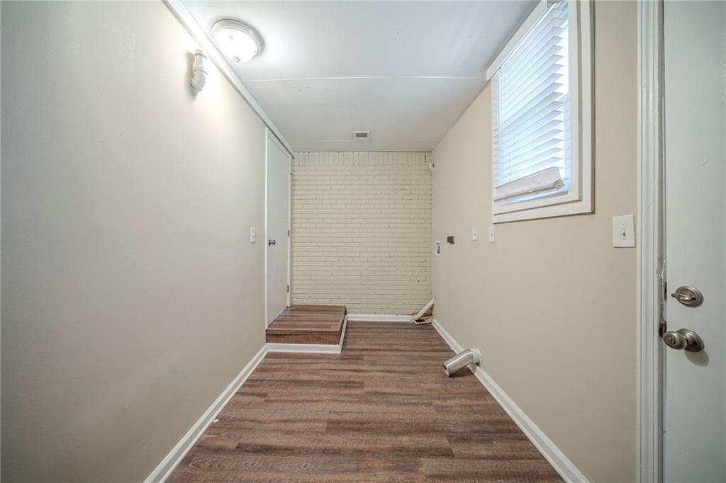 1433 Dennis Drive Decatur, GA 30032 - Photo 20 of 28 a view of a hallway with wooden floor